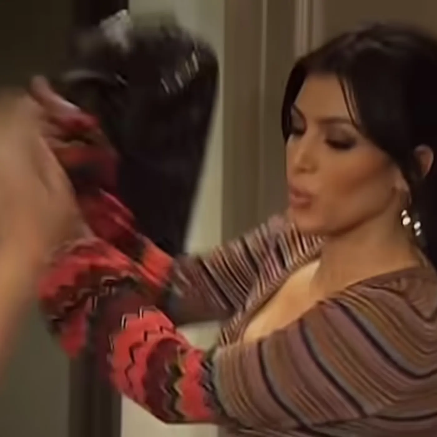 Kim Kardashian Recreates Infamous 'Purse Fight' with Khloé: A Nostalgic Throwback
