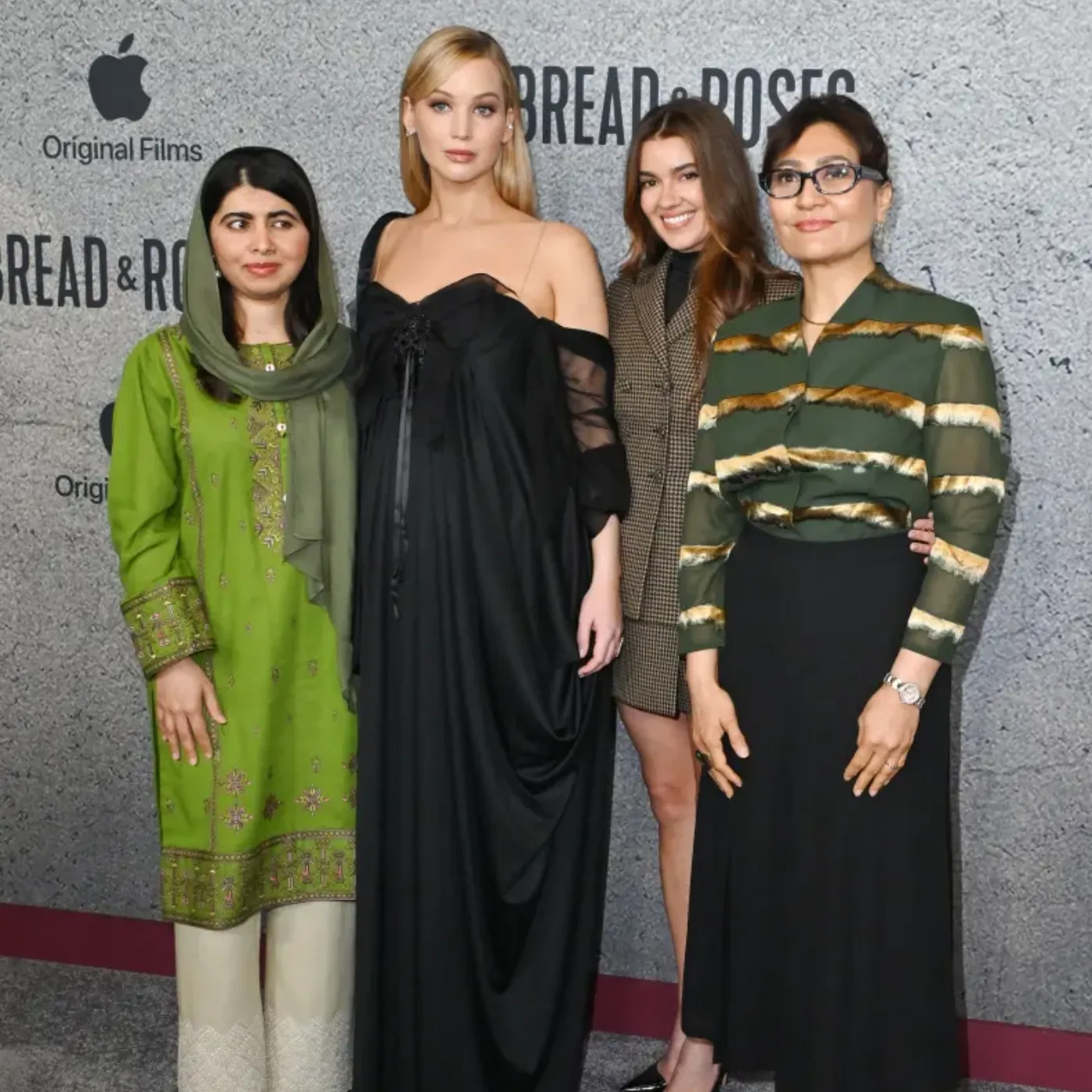 Jennifer Lawrence Stuns at Los Angeles Premiere of Bread & Roses Event !