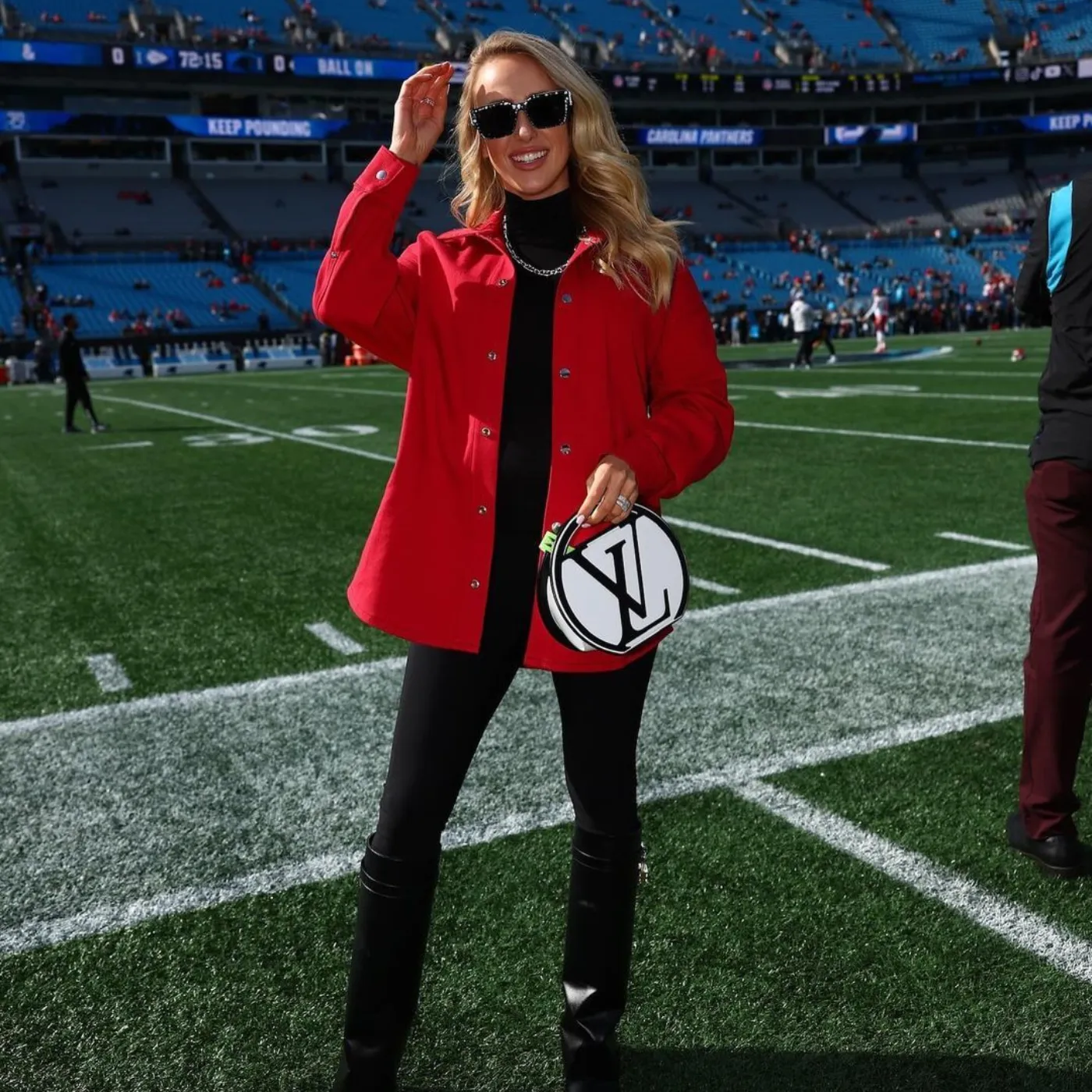Brittany Mahomes Stuns in Custom Red Jacket and $4,550 Louis Vuitton Handbag at Chiefs Game