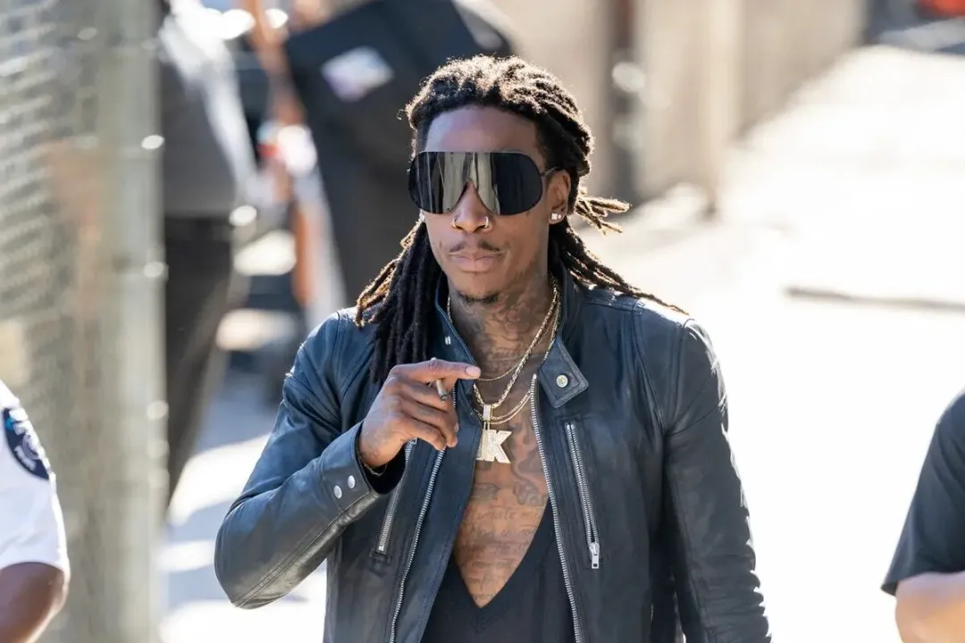 Wiz Khalifa got angry at the man who threw money at him during his performance.