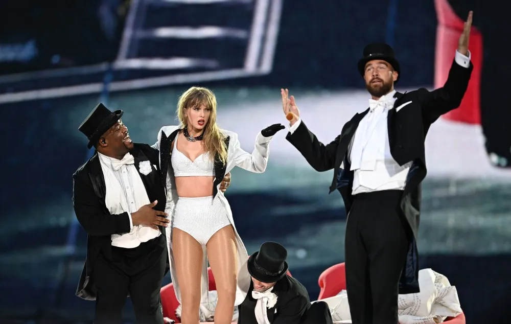 Travis Kelce Joins Taylor Swift on Stage for Surprise Eras Tour Appearance