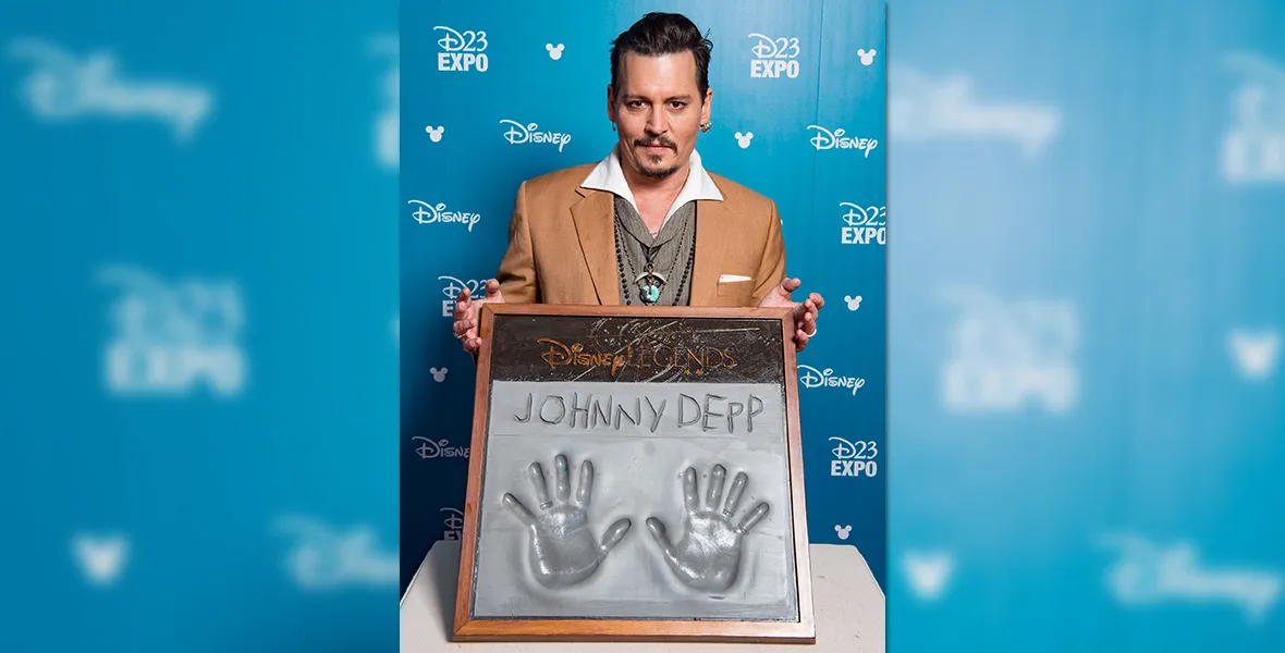 Disney paid a high price for a mistake involving Johnny Depp. Now they're begging him to come back? 2 Johnny Depp - D23