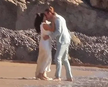 Kim Kardashian 'Marries' Handsome Co-Star on the Beach in Wedding Scene for All's Fair 2 Kim Kardashian 'Marries' Handsome Co-Star on the Beach in Wedding Scene for All's Fair