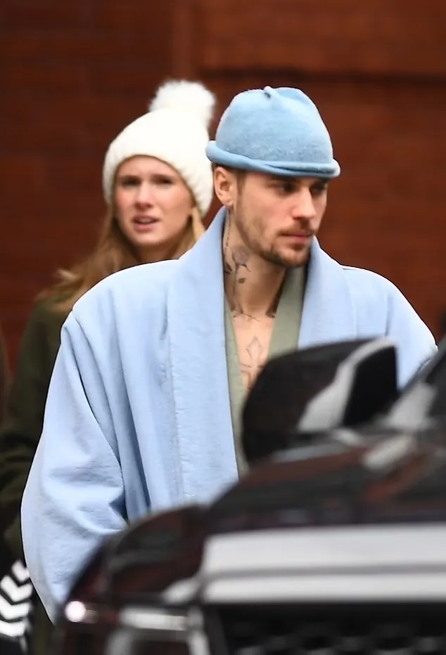 Justin Bieber Steps Out in a Bathrobe While Hailey Turns to Kendall for Support